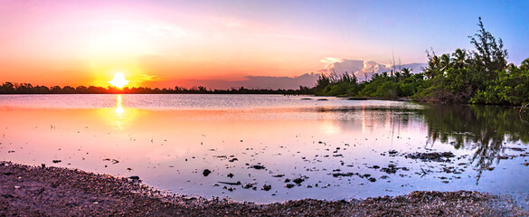beautiful sunset over lake in Araruama - RJ - obrazy, fototapety, plakaty
