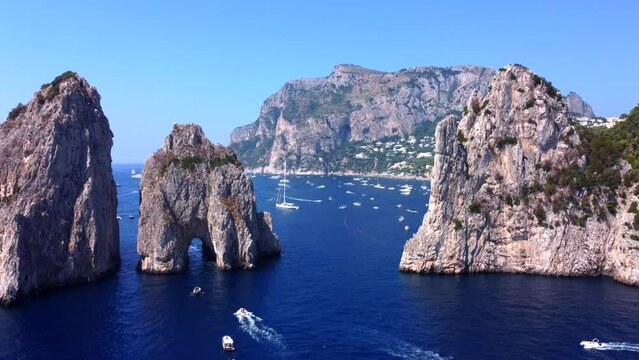 The Amalfi Coast is a breathtaking stretch of coastline in southern Italy, known for its vertiginous cliffs adorned with colorful villages, turquoise waters, and lush terraced gardens.