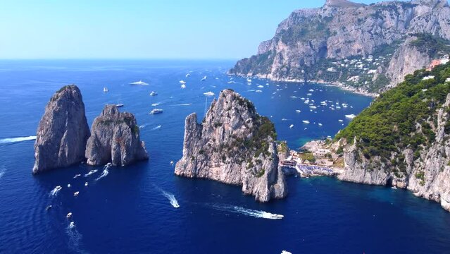 The Amalfi Coast is a breathtaking stretch of coastline in southern Italy, known for its vertiginous cliffs adorned with colorful villages, turquoise waters, and lush terraced gardens.