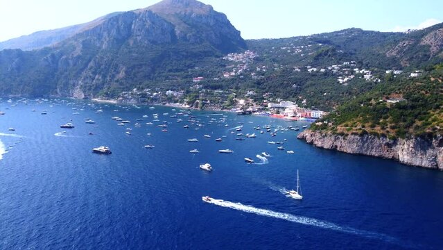 The Amalfi Coast is a breathtaking stretch of coastline in southern Italy, known for its vertiginous cliffs adorned with colorful villages, turquoise waters, and lush terraced gardens.