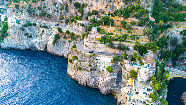 The Amalfi Coast is a breathtaking stretch of coastline in southern Italy, known for its vertiginous cliffs adorned with colorful villages, turquoise waters, and lush terraced gardens. 