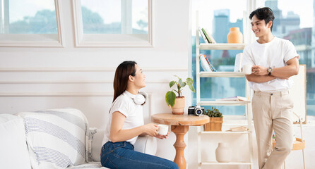 Obraz premium Photo of young Asian couple at home