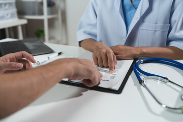 Asian female doctor or medical specialist examining a patient Ask for symptoms, give advice, recommend medication, plan treatment guidelines and preventive care. Concept of health checkup Prevention