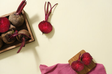 Fresh beetroot are decorated over pastel background with a towel in pink color. Using Beetroot (Beta vulgaris) for a healthy scalp and hair growth