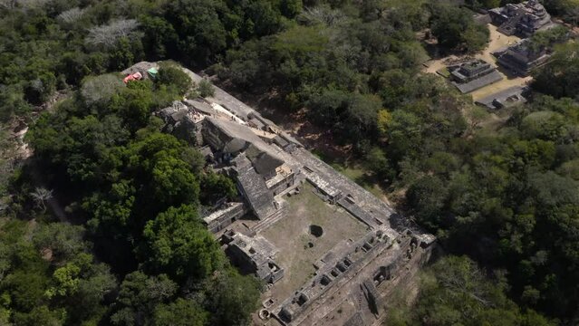 Stone pyramid in ruins of ancient mayan acropolis of Ek Balam, Mexico.