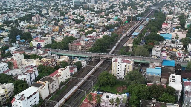 Aerial video of Kodambakkam Bridge is a road overbridge in the city of Chennai, India. Train crossing Opened in 1965, it is one of the oldest overbridges in the city.