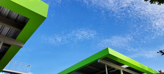 steel structure green color on blue sky white cloud minimal abstract background