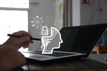 worker using laptop design algorithm for robotic to work , technology , concept