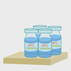 Four vials of HPV vaccine placed together. Concept Prevent HPV infection by vaccination before getting infected.