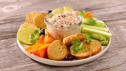 vegetarian dip table- cucumber, carrot,bread toast and tuna spread