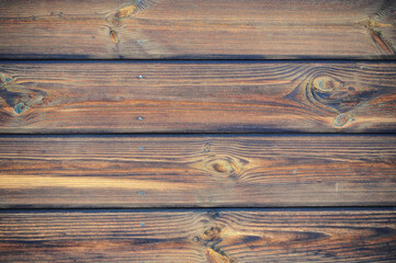 Naklejka premium wooden background made of boards and nails