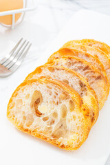 ciabatta bread, indoor closeup, white background, photographic shot