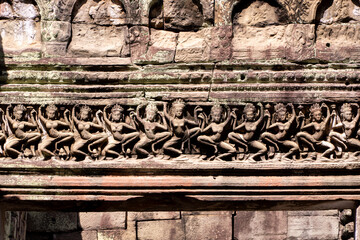 Carvings on walls of the ancient Angkor Wat temple of Khmer wome