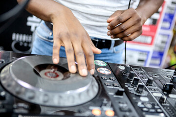 DJ on the mixing board