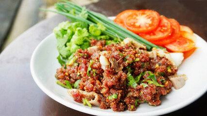 Isaan Food, Thai Food Dishes Larb Koi. Raw Beef Spicy Salad. Northeastern Thai Dishes. Raw meat mixed with spices is spicy.