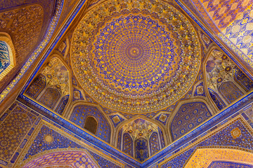 Painted gilded dome of Madrasa Tilya Kori (Registan complex). Gold and blue. Samarkand, Uzbekistan
