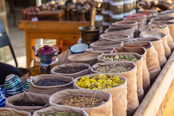 Bags of mixed spices and herbal tea in the street market. National cuisine and cooking concept....