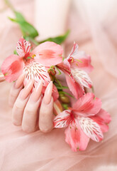 Obraz na płótnie Canvas Elegant pastel pink natural manicure.