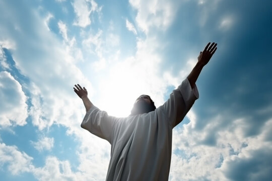 Jesus Christ reaching out with open arms in the sky, heaven.