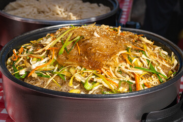 Glass Noodle Salad Street Food, Chinese Rice Noodles in Wok, Asian Pasta Food in a Large Pot, Korean Spaghetti