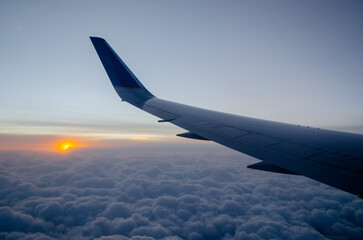 Fototapeta na wymiar Wing view from airplane window