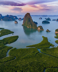 Sametnangshe, view of mountains in Phangnga Bay with mangrove forest in the Andaman Sea with evening twilight sky, travel destination in Phangnga, Thailand