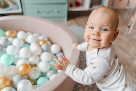 6 month old baby wants to play ball pool at home