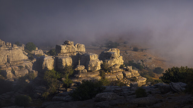 Lights on the rocks in the fog of the torcal de antequera. Spain