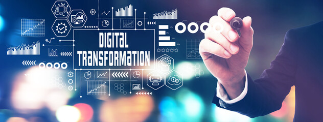 Digital transformation and technological revolution concept with a businessman in a blurred city lights at night
