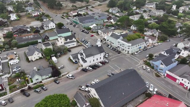 Aerial California Mendocino city Masonic Lodge. Scenic city by Pacific Ocean an artist colony and vacation destination. California State Route 1, Shoreline Highway. Coast often in fog and clouds.