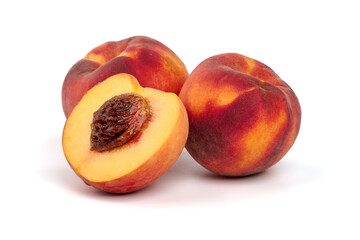 Fresh peaches and juicy slice, isolated on white background.