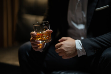 Businessmen in suits drinking  Celebrate whiskey