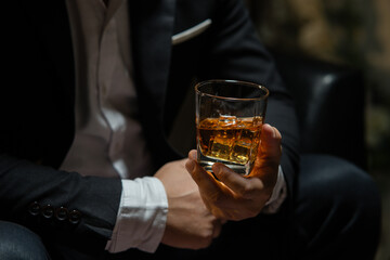 Businessmen in suits drinking  Celebrate whiskey