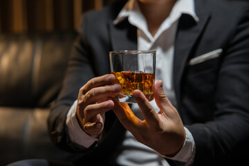 Businessmen in suits drinking  Celebrate whiskey