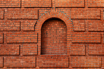 Fototapeta na wymiar A texture made of an old red brick wall.