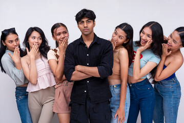 6 pretty asians look at and admire at a stoic and cool Indian guy. The campus crush and ladies man....