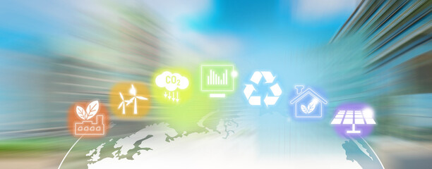 Renewable energy icons in rainbow colors. Motion blur of sunny city with blue sky background.