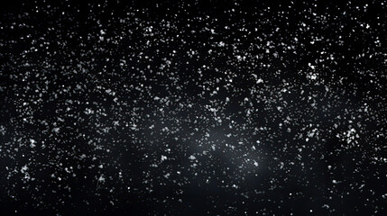 Snow or snowflakes falling texture. Concept of a blizzard or snowfall. Black Matte to use as an overlay. Shallow field of view.