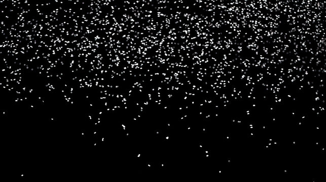 Snow or snowflakes falling texture. Concept of a blizzard or snowfall. Black Matte to use as an overlay. Shallow field of view.