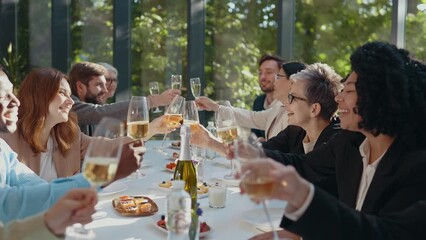 Cinematic footage of a business corporate party. Group of businessmen and businesswomen celebrating the annual company achievements 