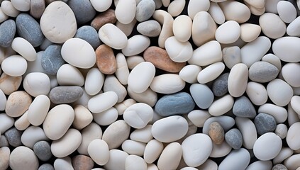 White and gray pebbles background, top view, close up