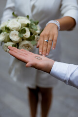 bride and groom holding hands