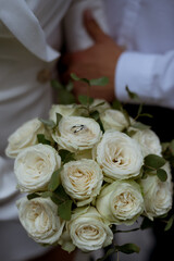 bride and groom holding hands