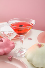 Table setting for Halloween in white and pink tones