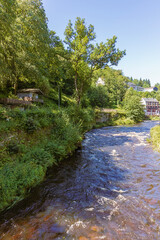 The Rur river near the entrance of Monschau on a sunny summer day