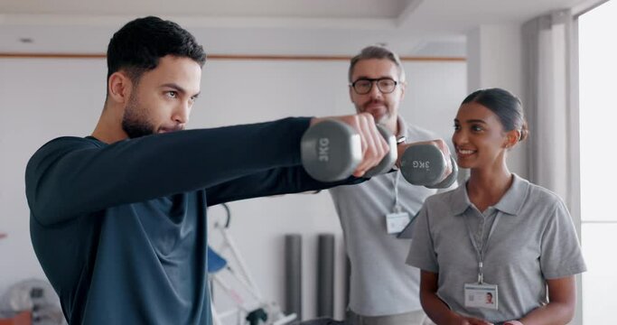 People, help and dumbbell for patient in sports clinic, muscle rehabilitation and strength training. Men, woman and physiotherapist team with athlete, weights and tablet for personal trainer progress