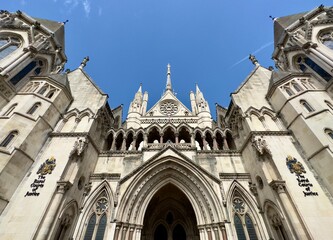 Low angle view of the Royal Courts of Justice building in London, UK. 