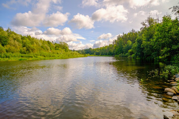 Fototapeta na wymiar Gauja, the longest river in Latvia. A summer day by the river