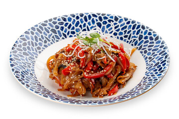 Wok-fried vegetables and mushrooms, Asian style, on a decorative plate.