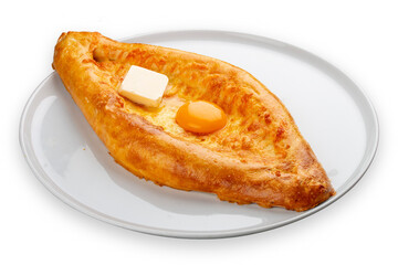 Adjar-style khachapuri with cheese, egg and butter. Caucasian cuisine. Isolated image on a gray background.